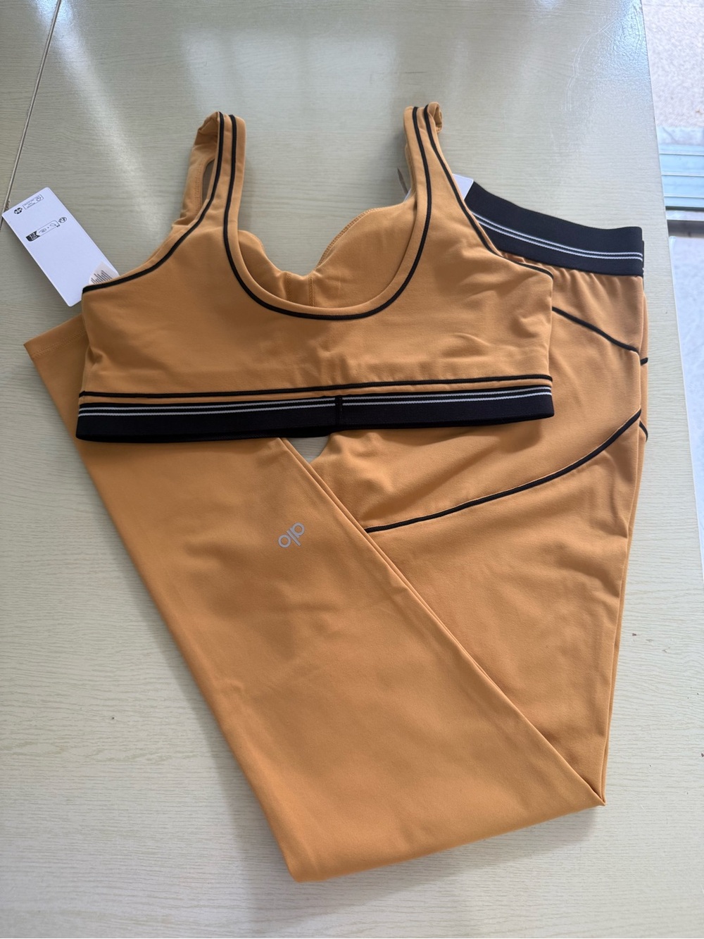 ALO Yoga Mustard Sports Bra with Black Trim - Picture 4 of 6